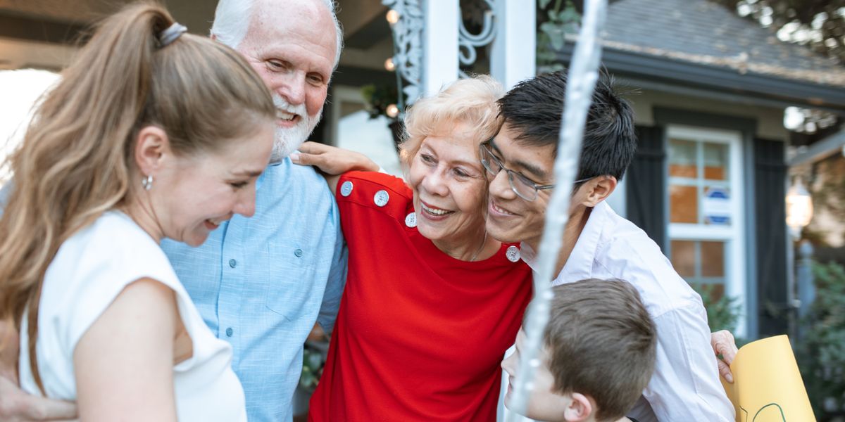 A multigenerational family embracing